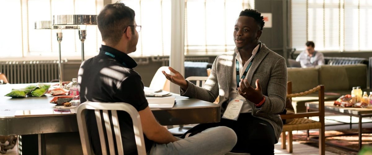 photo-of-men-having-conversation-935949